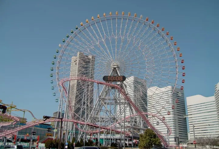 LUMIX G VARIO 14-140/F3.5-5.6 · 19mm · ISO 400 · 1/1387s · f/3.9 Cosmo Clock ferris wheel and rollercoaster in Yokohama, captured with Caira