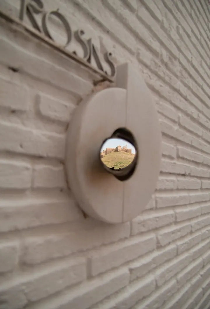 LUMIX G VARIO 14-140/F3.5-5.6 · 15mm · ISO 400 · 1/473s · f/3.6 Mirrored sphere set in a sculpted brick wall, captured with Caira