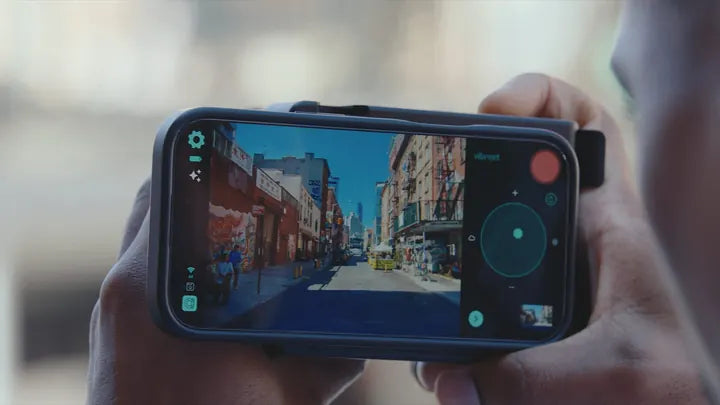 Caira app on iPhone showing the Smart Styles picker over a street scene · camera visible