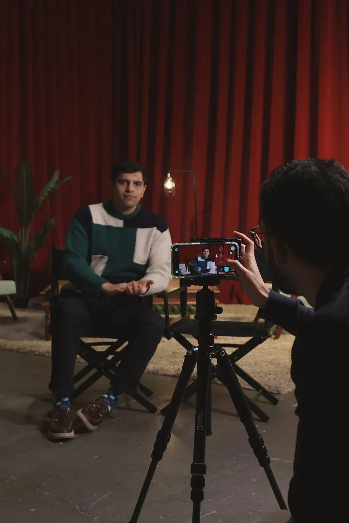 Solo creator filming with Caira
