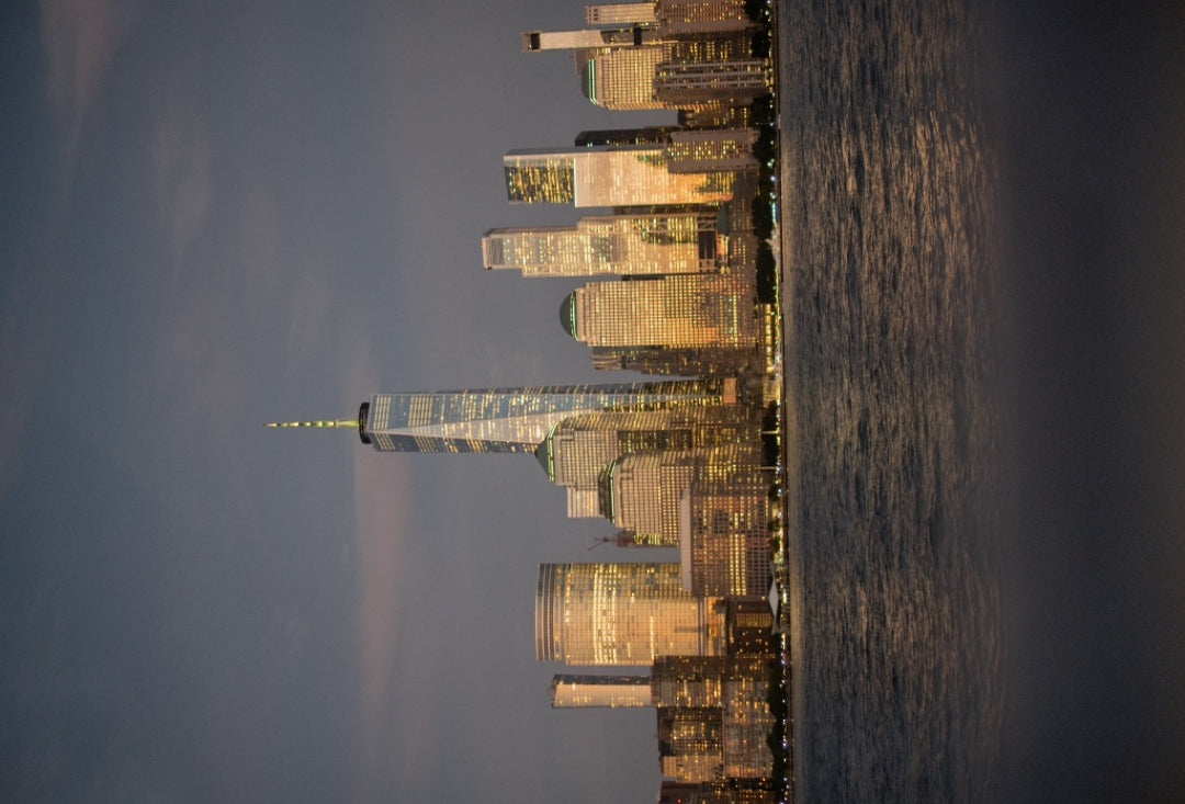 One World Trade Center and lower Manhattan at dusk — captured with Caira