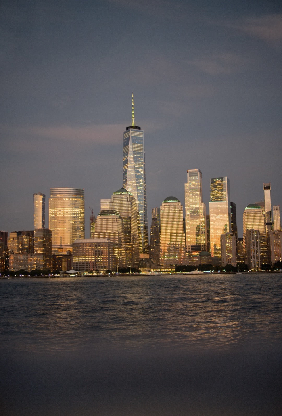 One World Trade Center and lower Manhattan at dusk