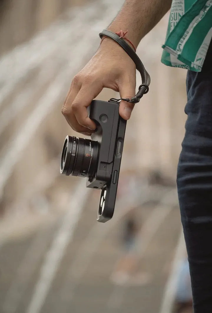 Caira carried on its wrist strap