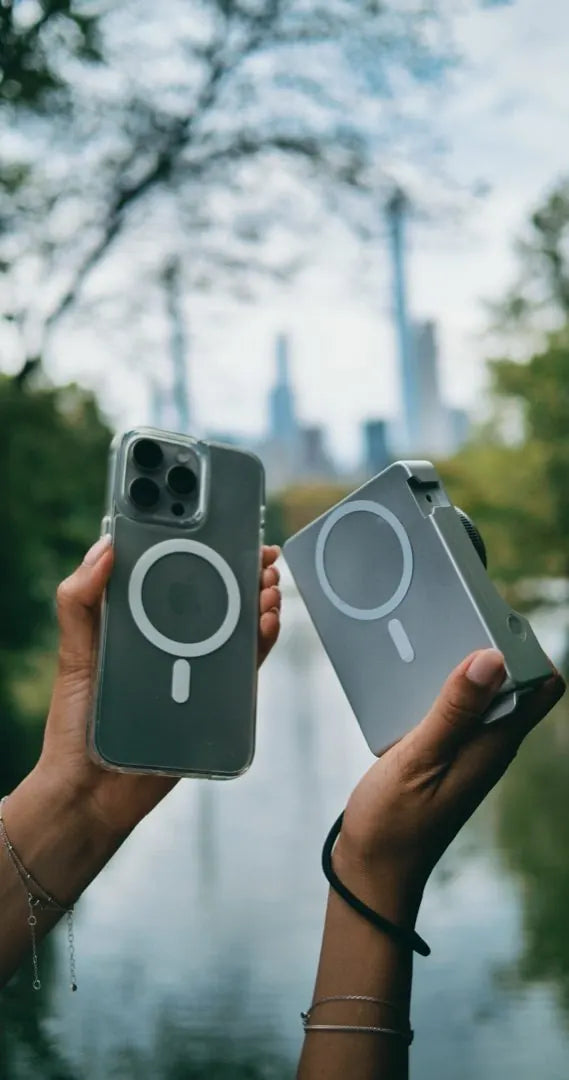 Two hands holding an iPhone and Caira showing both MagSafe rings